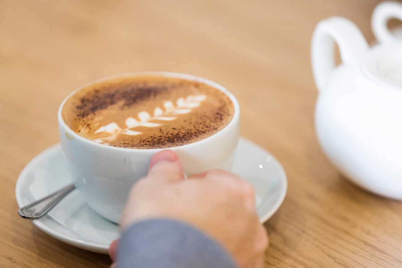 Child's hand in adult's hand